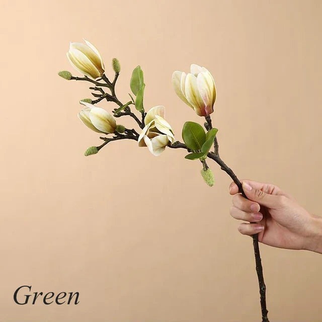 Atmospheric Branch Decor Featuring Lifelike Magnolia Blooms
