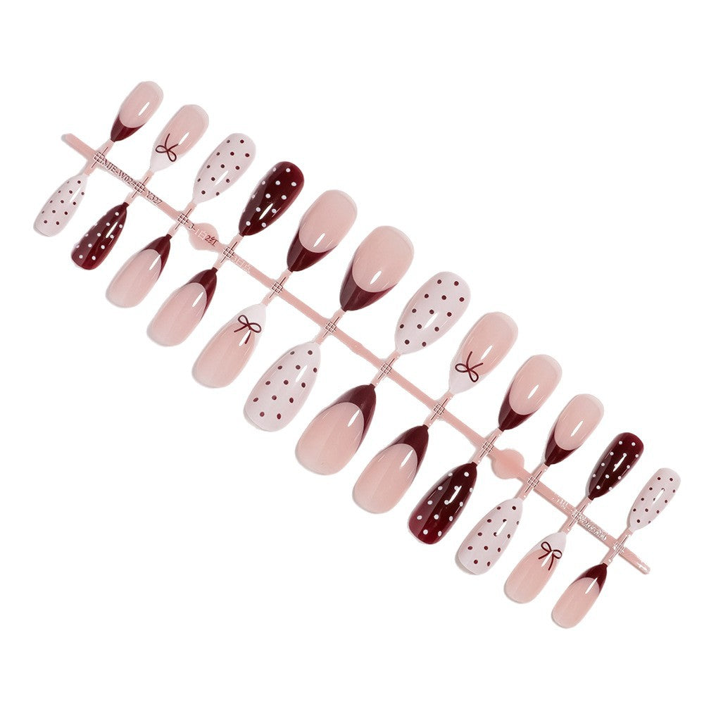 Press-On Nail Art Set Featuring Bow and Dot Patterns
