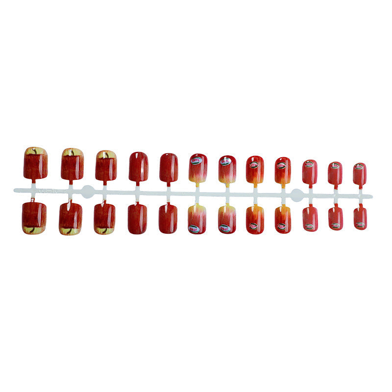 Press-On Nail Kit Featuring Creative Apple Patterns