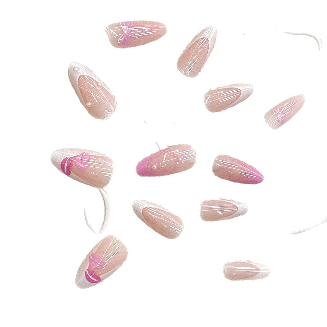 Press-On Nail Kit Featuring Bow and Kiss Patterns