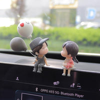 gray couple balloon