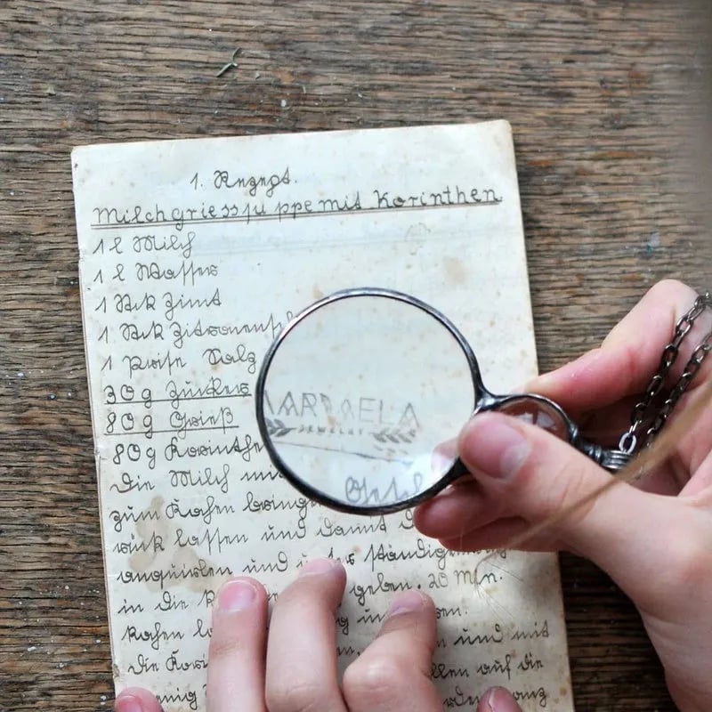 Necklace Featuring a Magnifying Pendant