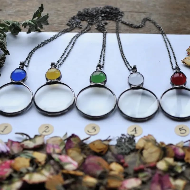 Necklace Featuring a Magnifying Pendant
