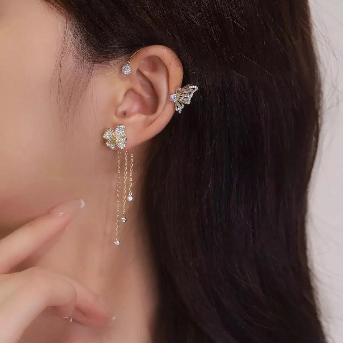 Charming Clip-On Earrings with Butterfly and Floral Design