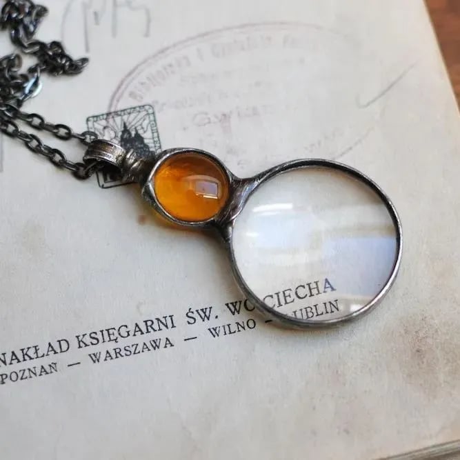 Necklace Featuring a Magnifying Pendant