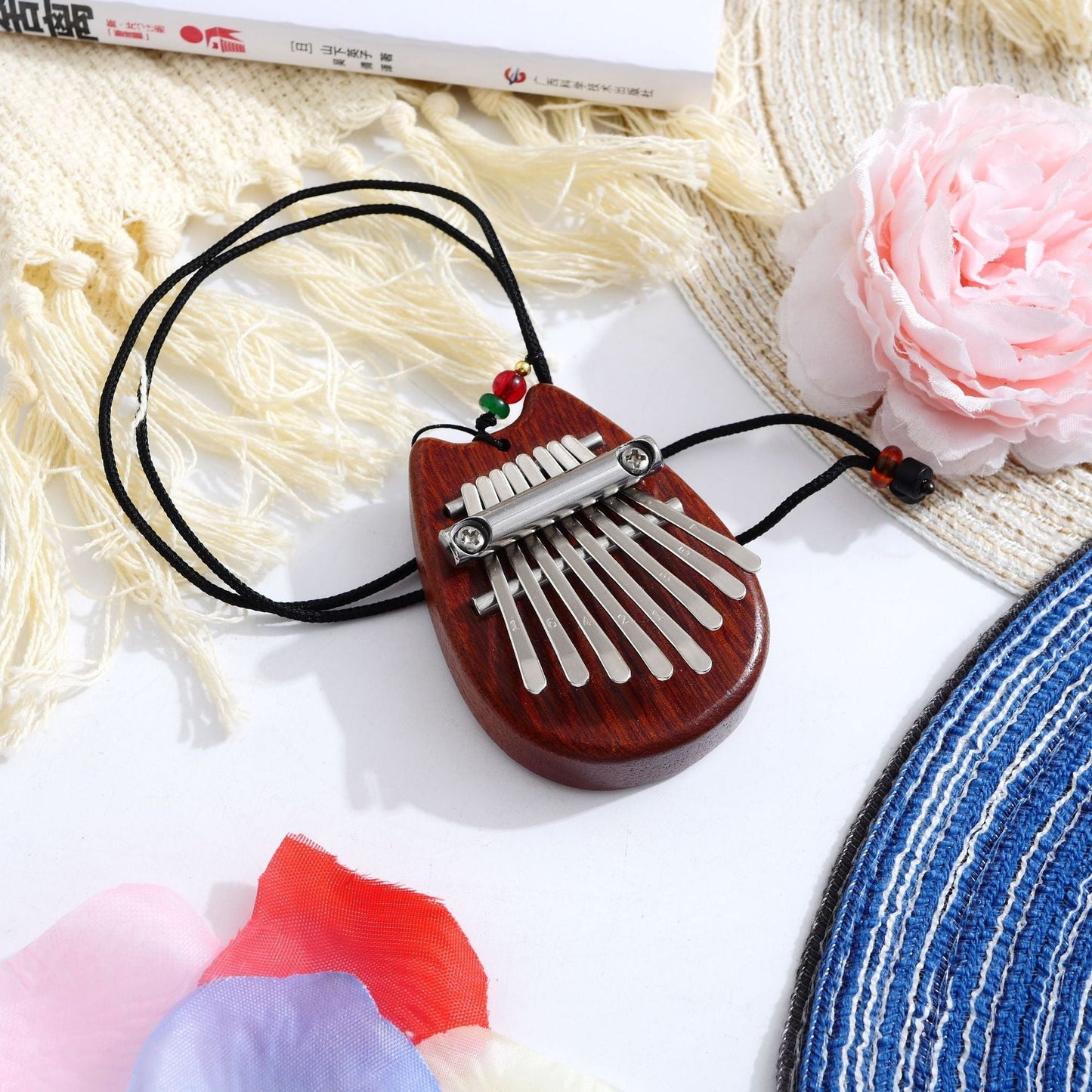 Pocket-Sized Melody Maker: 8-Key Thumb Piano