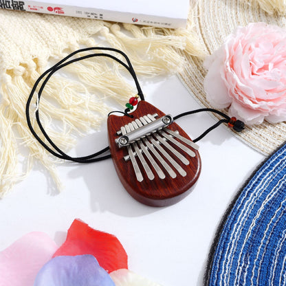 Pocket-Sized Melody Maker: 8-Key Thumb Piano