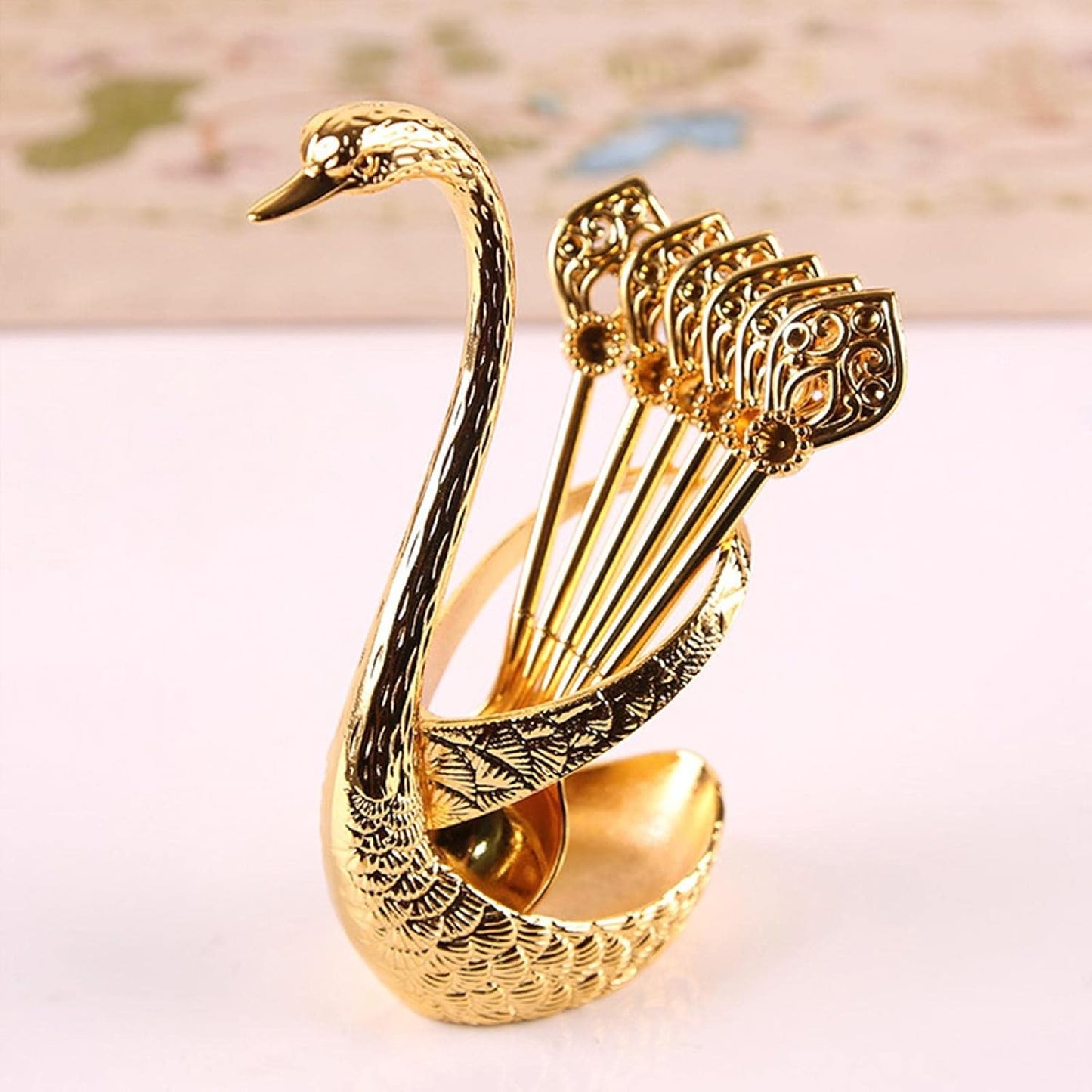Elegant Swan-Shaped Spoons for Transforming Coffee Moments