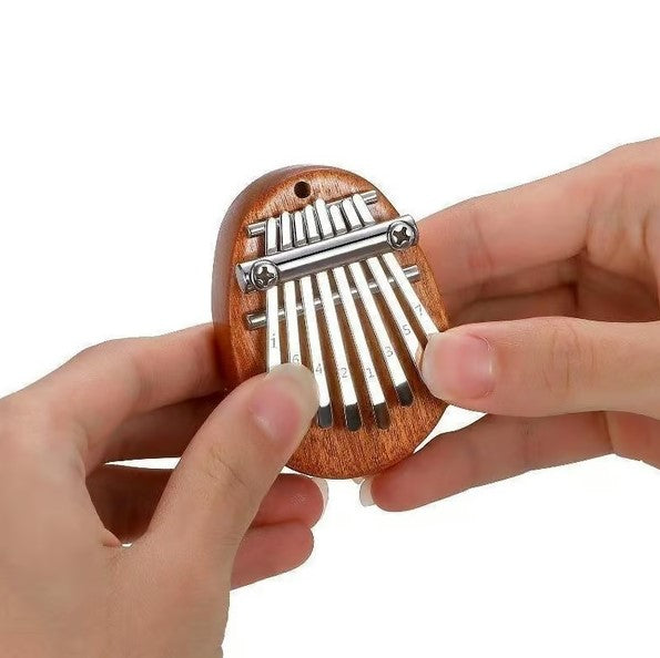 Enchanting 8-Key Mini Piano for On-the-Go Melodies