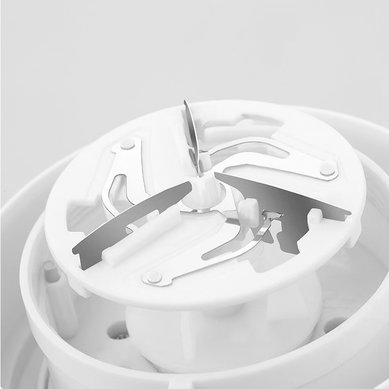 Rechargeable Fabric Shaver with Triple Blade System