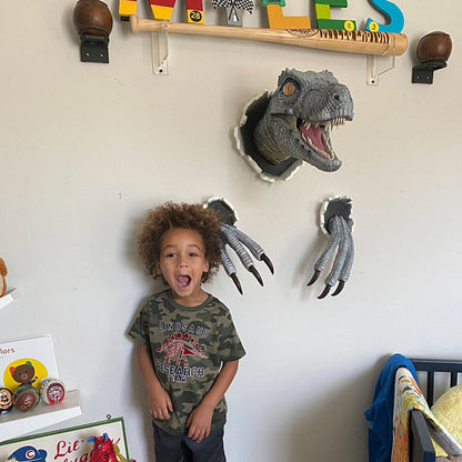 Wall Decor Featuring Bursting Velociraptor Design