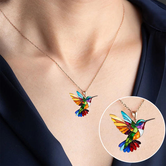 Colorful Necklace Featuring Colibri Charm with Symbolic Significance