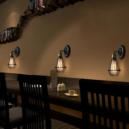 Industrial-Style Wall Light Fixture with Adjustable Iron Design