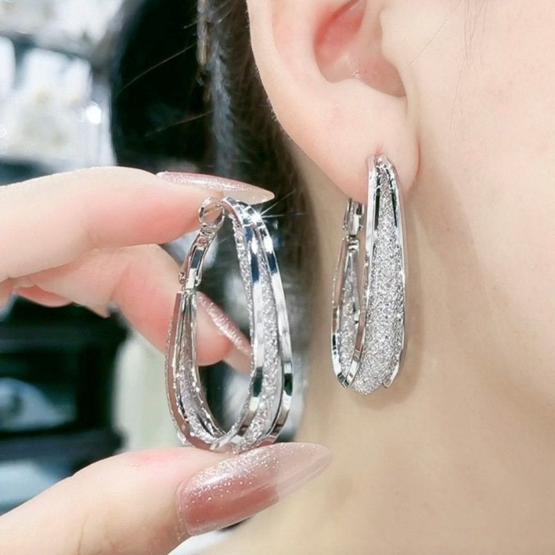 Radiant Twist Hoop Earrings for a Dazzling Look