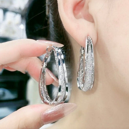 Radiant Twist Hoop Earrings for a Dazzling Look
