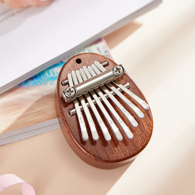 Pocket-Sized Melody Maker: 8-Key Thumb Piano