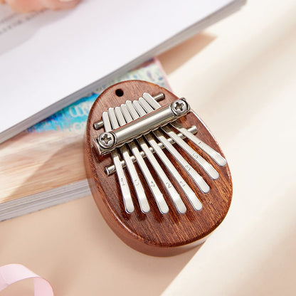 Pocket-Sized Melody Maker: 8-Key Thumb Piano