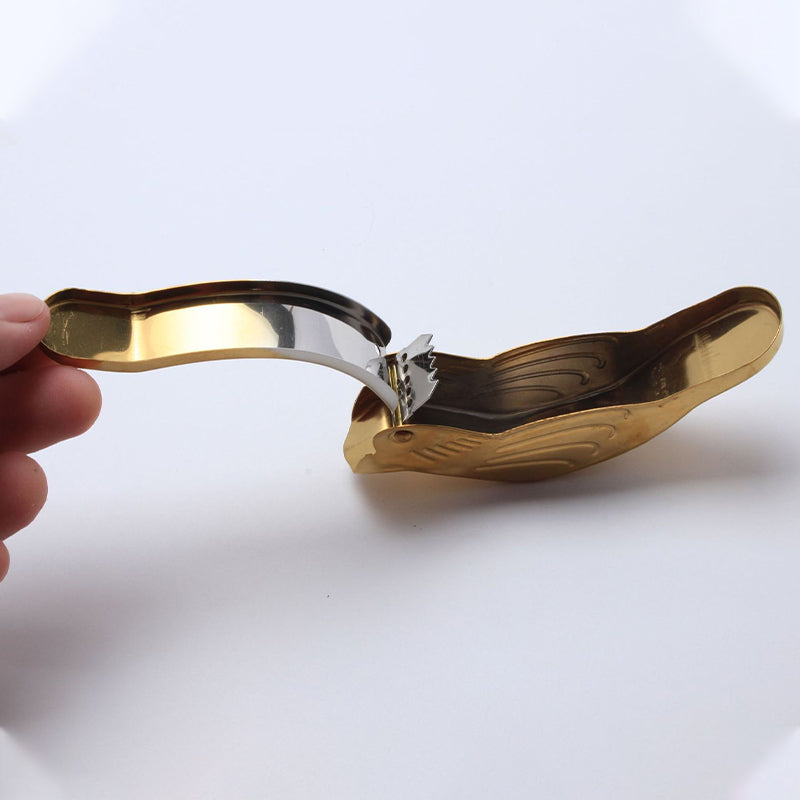 Handheld Juicer in Bird Design