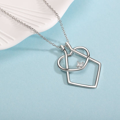 Heart-Shaped Necklace with Ring Holder – Floral Elegance Design
