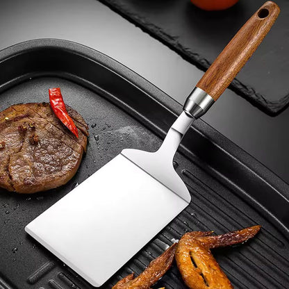 Versatile Stainless Steel Turner with Ergonomic Wooden Grip