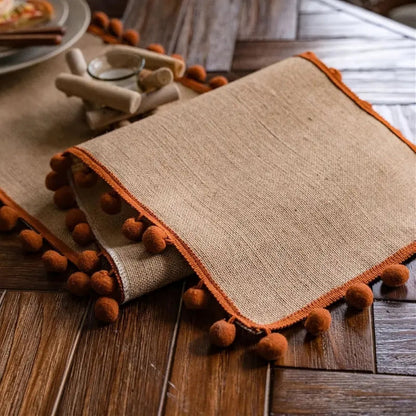 Chic Natural Fiber Table Runner with Pom-Pom Accents