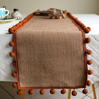 Chic Natural Fiber Table Runner with Pom-Pom Accents