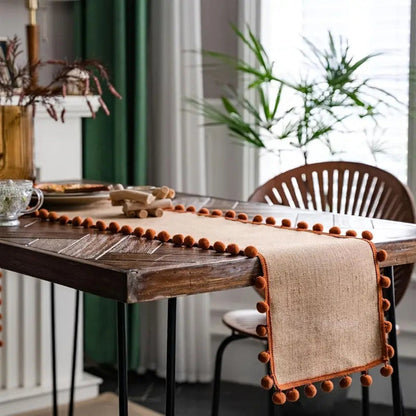 Chic Natural Fiber Table Runner with Pom-Pom Accents