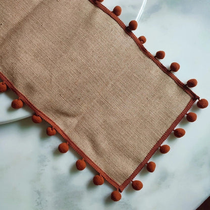 Chic Natural Fiber Table Runner with Pom-Pom Accents