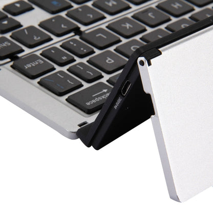 Ultra-slim 58-Key Bluetooth Wireless Keyboard with Holder – Rechargeable, Foldable (Silver)