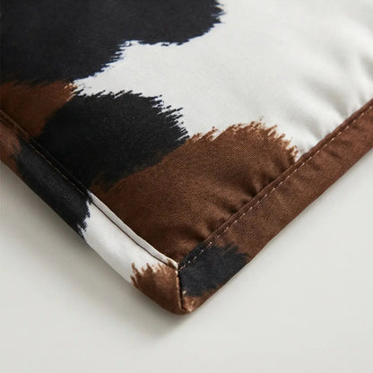 Rustic Elegance Bedspread Set Featuring Cowhide Motif