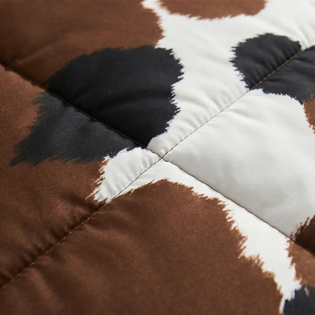 Rustic Elegance Bedspread Set Featuring Cowhide Motif