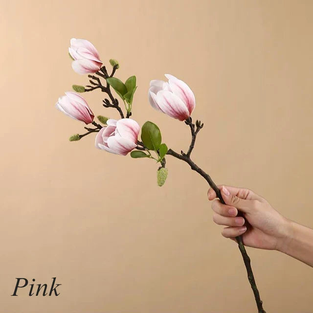 Atmospheric Branch Decor Featuring Lifelike Magnolia Blooms