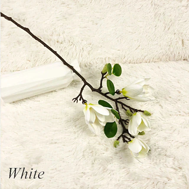 Atmospheric Branch Decor Featuring Lifelike Magnolia Blooms