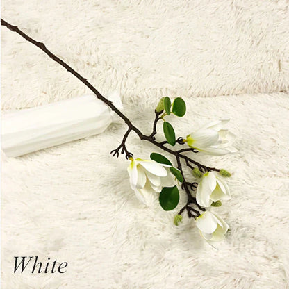 Atmospheric Branch Decor Featuring Lifelike Magnolia Blooms