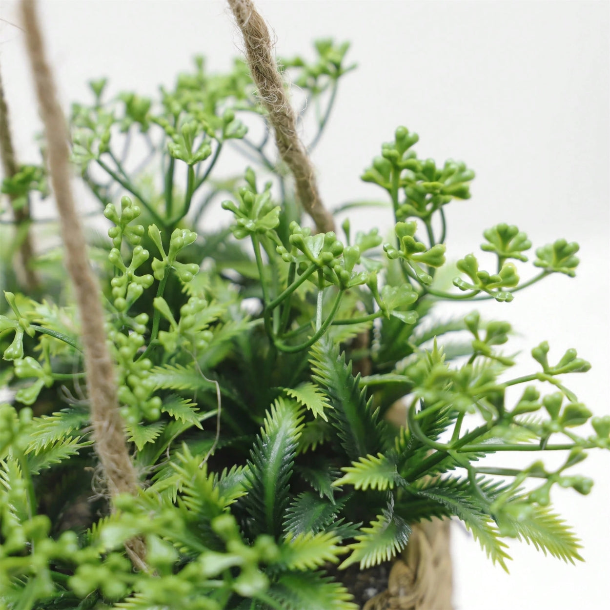 Breezy Green Hanging Faux Plant in Natural Woven Basket