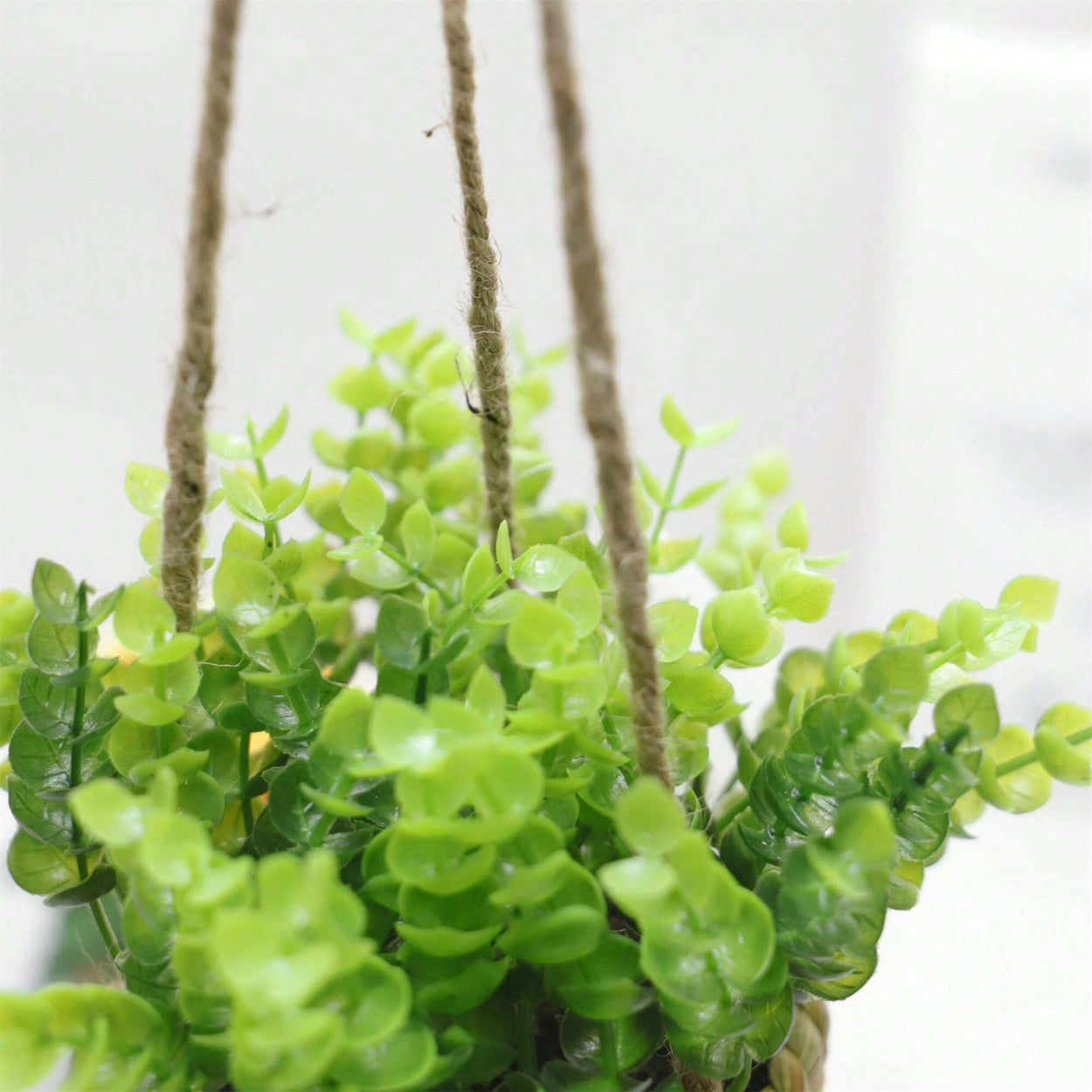 Breezy Green Hanging Faux Plant in Natural Woven Basket