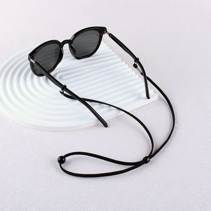 Eyewear Retainer with Adjustable Cord