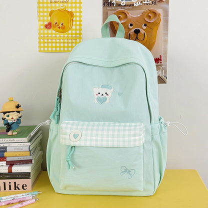 Charming School Backpack with Fun Character Design