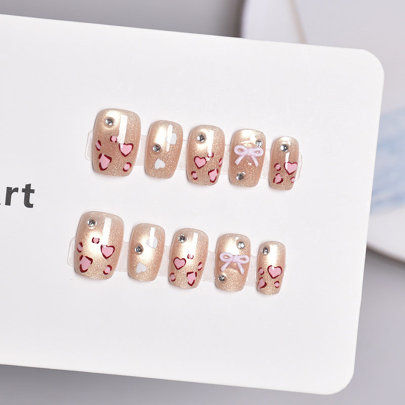 Press-On Nail Art Set Featuring Heart and Bow Patterns