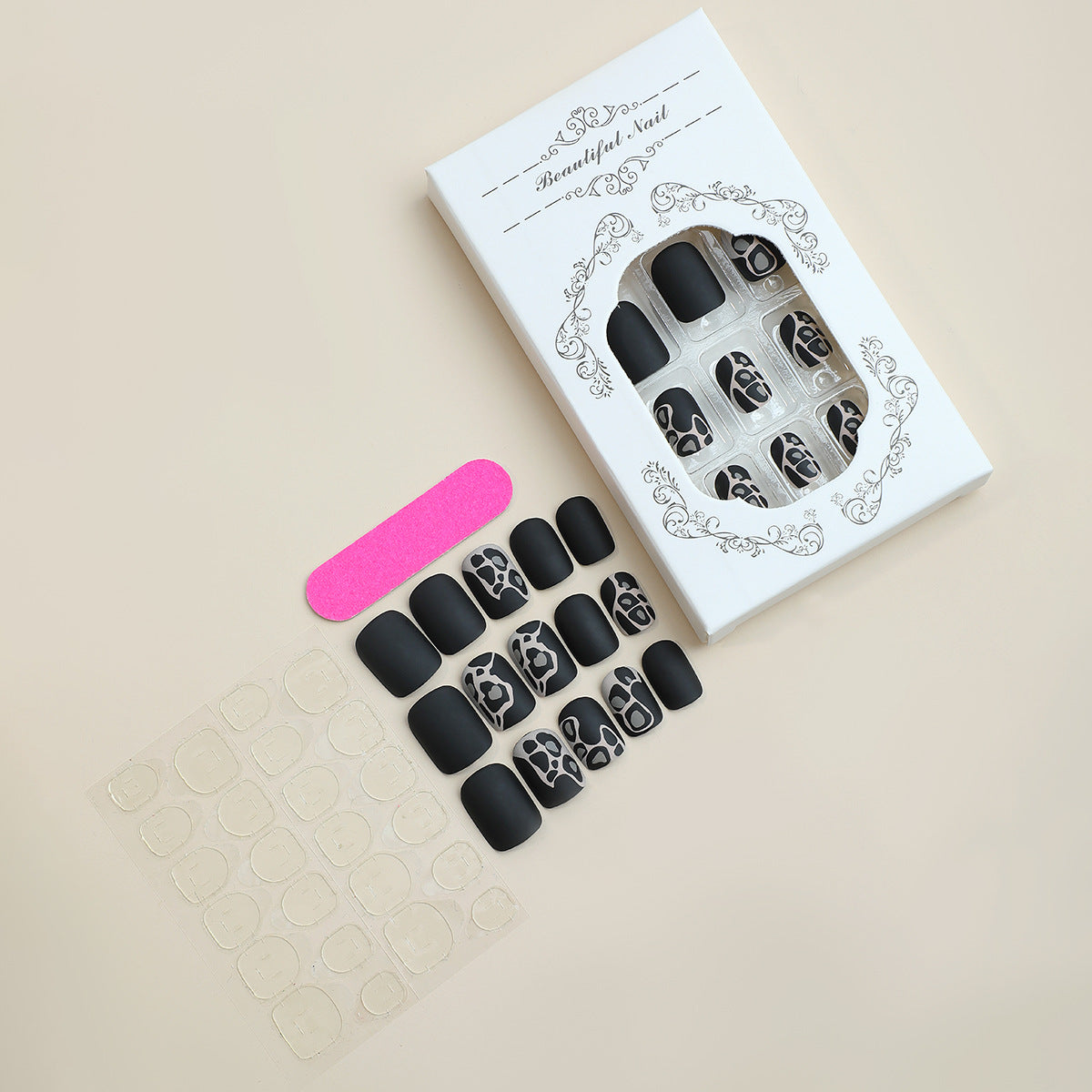 Elegant Design Press-On Nail Set with Artistic Elements