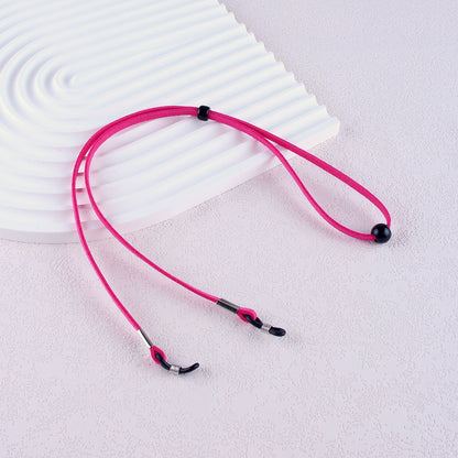 Eyewear Retainer with Adjustable Cord