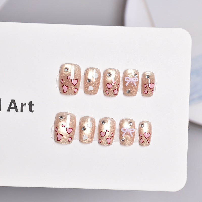 Press-On Nail Art Set Featuring Heart and Bow Patterns