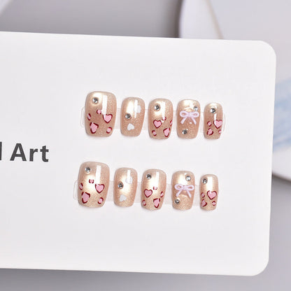 Press-On Nail Art Set Featuring Heart and Bow Patterns