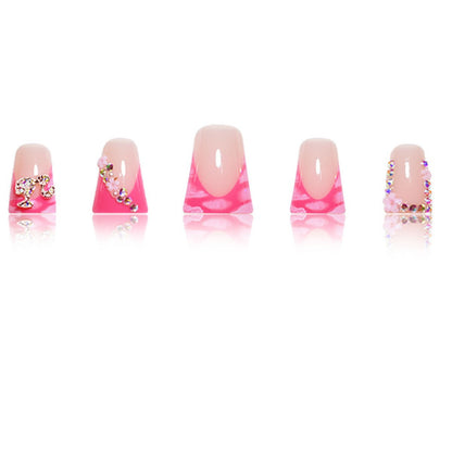 Decorative Press-On Nail Extensions Featuring Rhinestone Details
