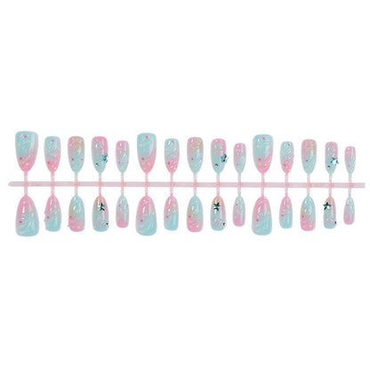 Press-On Nail Kit Featuring Star and Wave Patterns