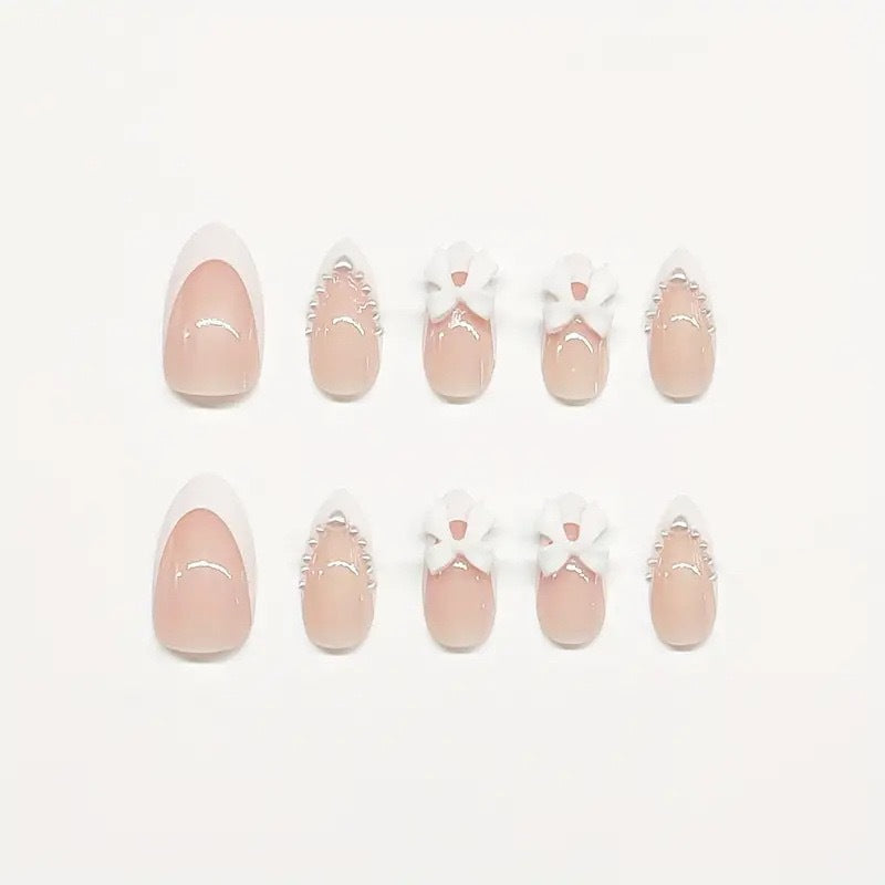Press-On Nail Art Featuring Bow Details
