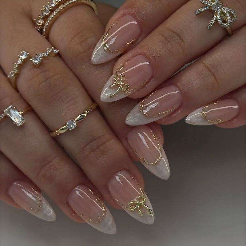 Nail Tips with Artistic Design and Gold Accents