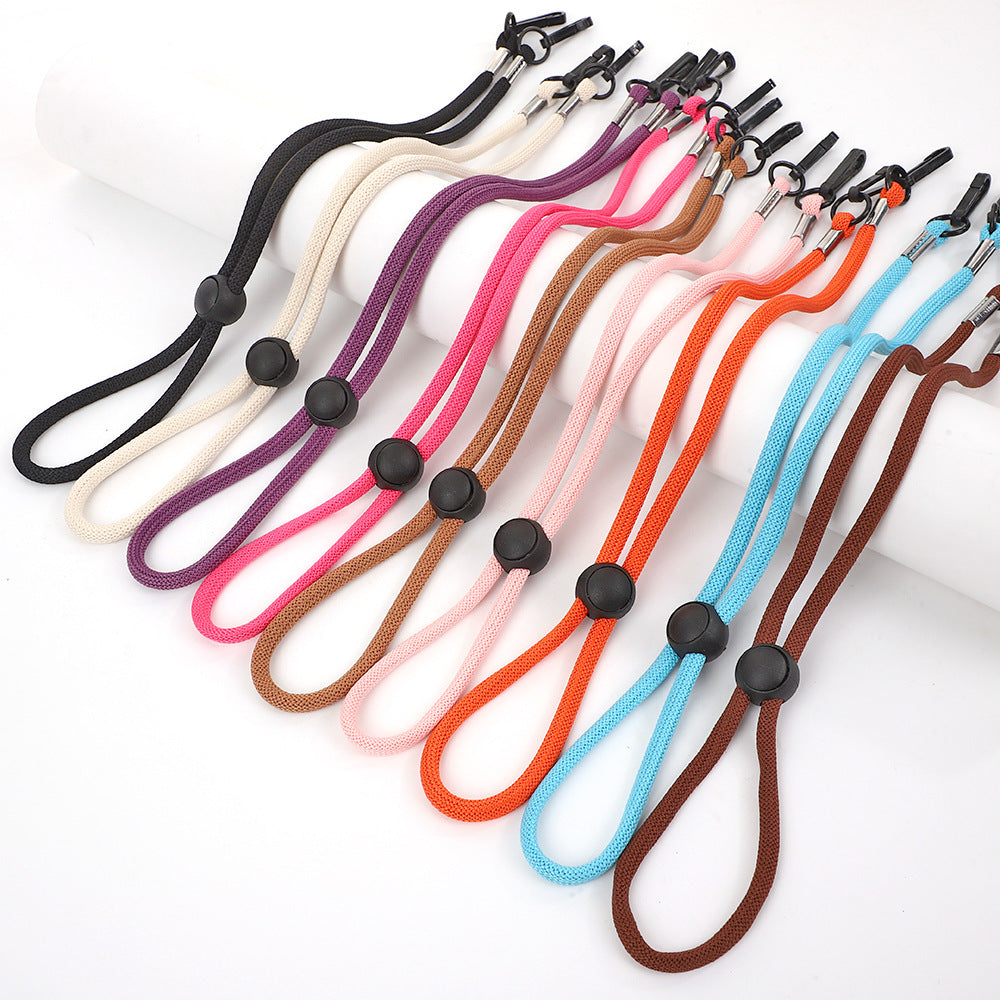 Eyewear Holder with Adjustable Grips