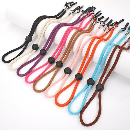 Eyewear Holder with Adjustable Grips