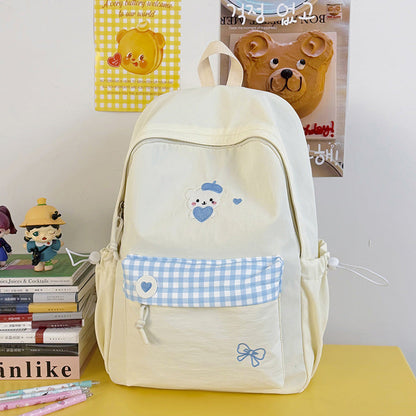 Charming School Backpack with Fun Character Design